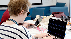 A student with a visual disability codes on a computer during last year's OurCS workshop. A student with a visual disability codes on a computer during last year's OurCS workshop.