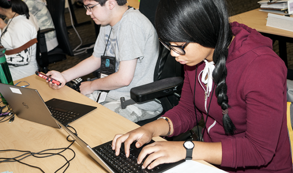 Two students working in a computer lab